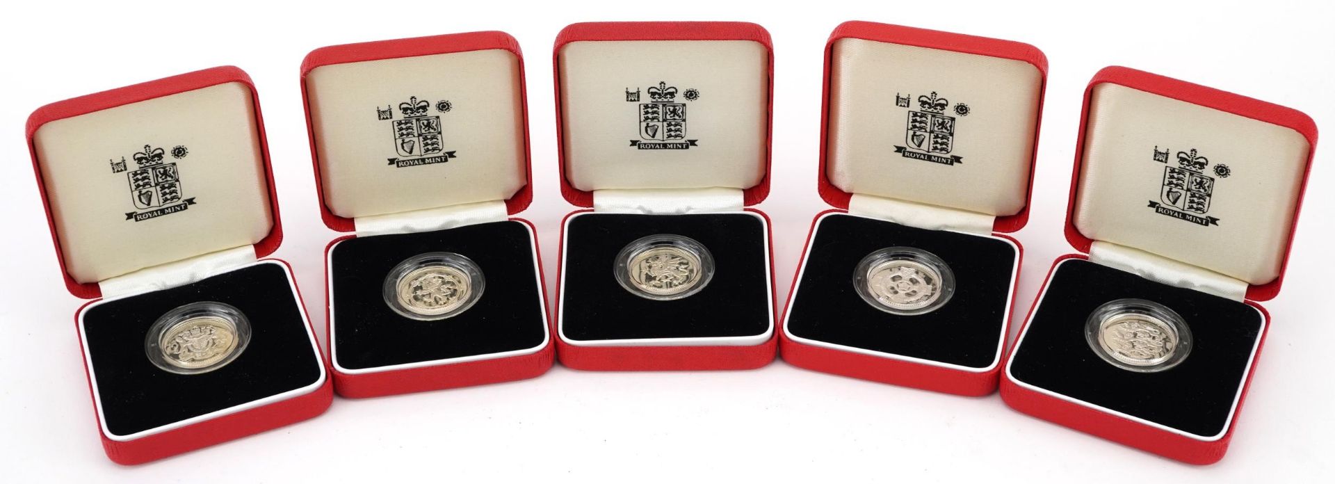 Five United Kingdom silver proof piedfort one pound coins by The Royal Mint with certificates and