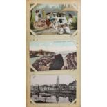 Collection of topographical and social history postcards arranged in an album including Newquay