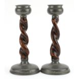 Warston, pair of Arts & Crafts planished pewter and oak barley twist candlesticks, each 20.5cm