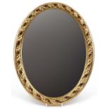 Oval gilt framed wall hanging mirror with bevelled glass, 45cm x 34.5cm : For further information on