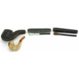 19th century Meerschaum smoking pipe with amber coloured mouthpiece in the form of a man wearing a