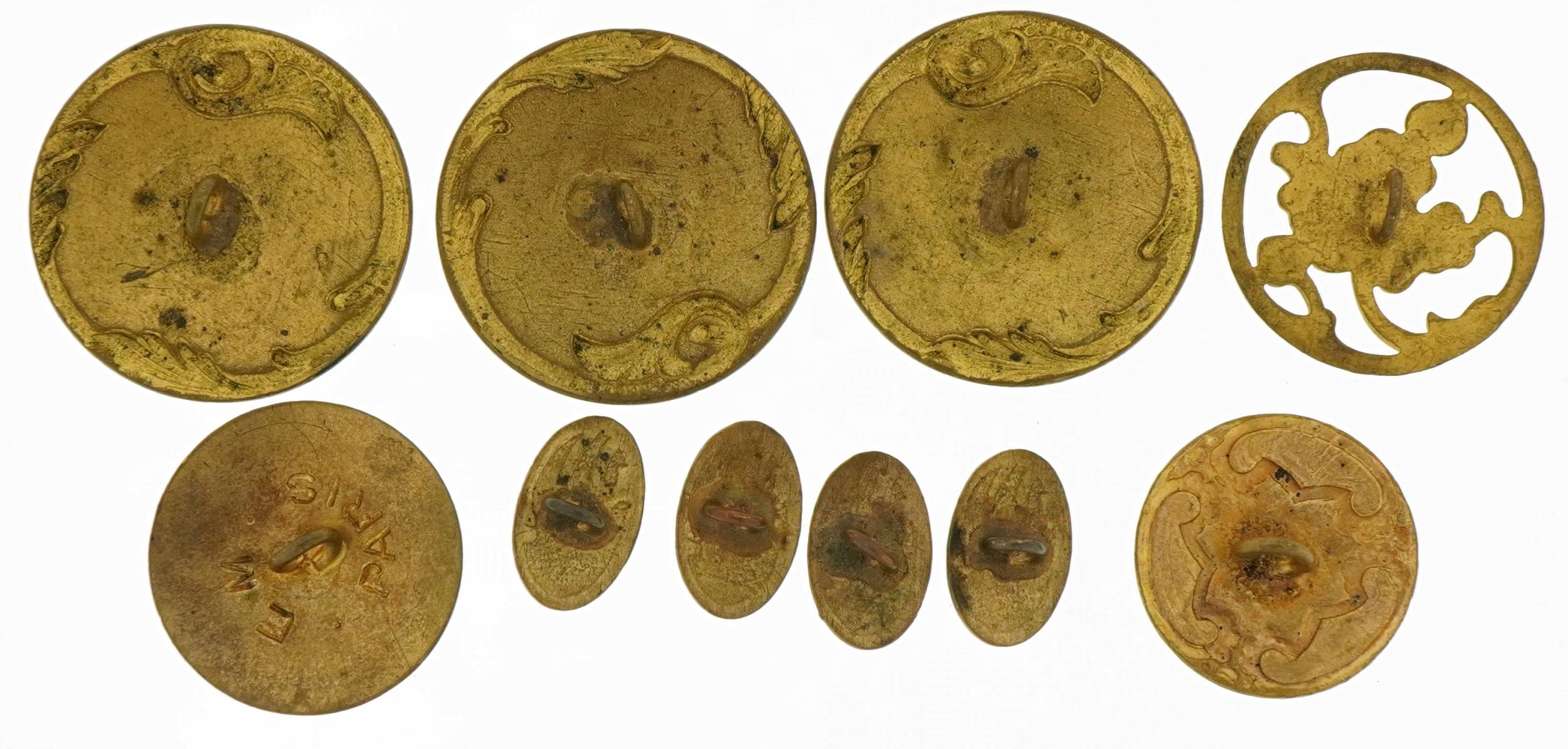 Ten early 20th century brass and enamel buttons comprising nine hand painted with flowers and an Art - Image 2 of 2