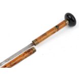 Early 20th century ladies bamboo walking swordstick with steel blade, 87cm in length : For further