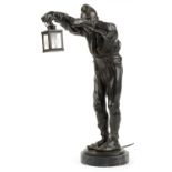 Franz Bernauer, early 20th century patinated bronze lamp in the form of a night watchman holding a