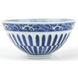 Chinese Islamic porcelain bowl hand painted with flower heads amongst scrolling foliage, four figure