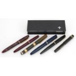 Six vintage fountain pens including Watermans Ideal, Stephens red marbleised and Parker, three