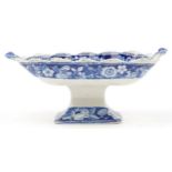 Early 19th century blue and white pottery comport transfer printed with hop pickers, 26cm wide : For