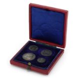 Edward VII 1902 Maundy four coin set housed in a silk and velvet lined fitted tooled leather