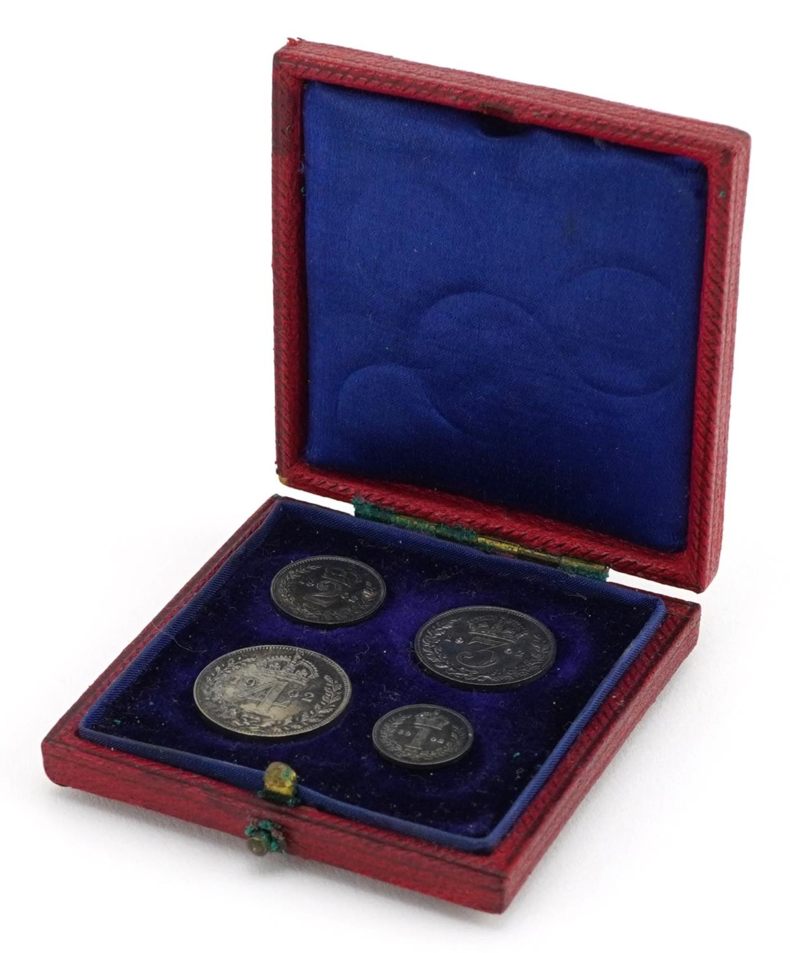 Edward VII 1902 Maundy four coin set housed in a silk and velvet lined fitted tooled leather