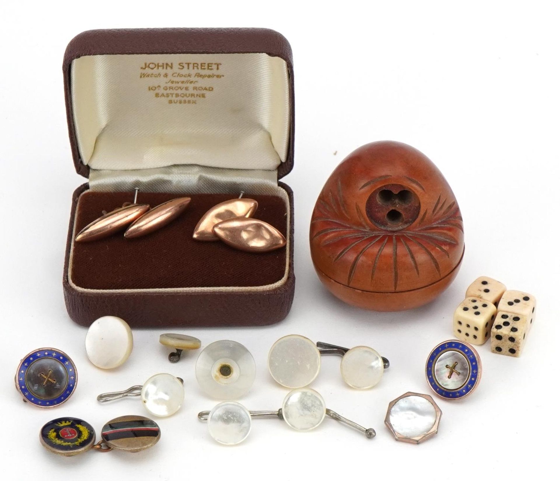 Japanese Kobe doll with four bone dice and various cufflinks including one 9ct gold and mother of