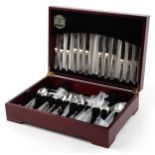 Guy Degrenne six place mahogany canteen of silver plated cutlery for the Orfevre Collection, the