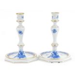 Herend, pair of Hungarian porcelain candlesticks hand painted with flowers, each 17.5cm high : For