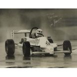 Motor racing interest signed photographic display inscribed To Frank, Best Wishes...?, mounted,