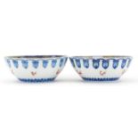 Pair of Japanese Fukagawa porcelain bowls hand painted with continuous landscapes, each 13.5cm in