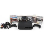 Sony PlayStation 3 games console with two controllers and a collection of games : For further