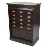 Oak twenty four drawer haberdashery chest with tambour front, 115.5cm H x 86.5cm W x 49.5cm D :