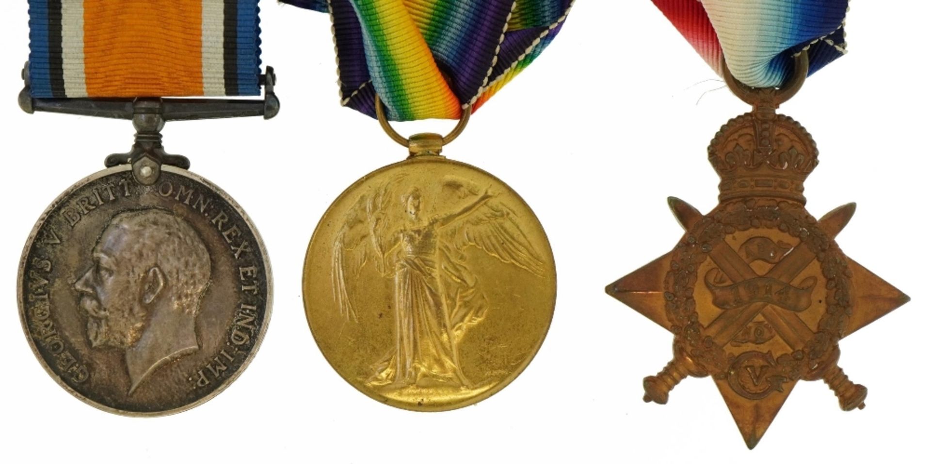 British military World War I trio with Mons star awarded to L-10013PTE.H.M.A.DYER.E.KENTR.,