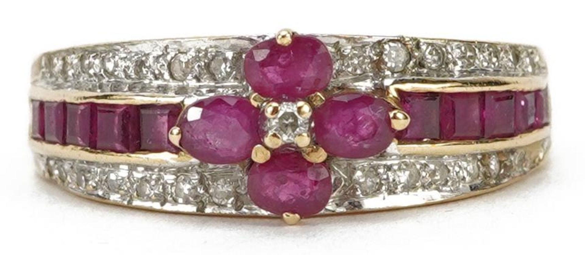 9k gold ruby and diamond three tier flower head ring, size Q, 3.0g : For further information on this