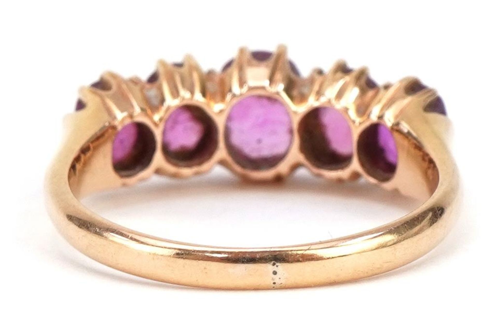 Unmarked gold ruby graduated five stone ring, tests as 18ct gold, possibly Indian, the largest - Image 2 of 3