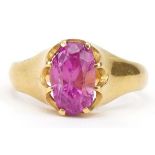 Unmarked gold ruby solitaire ring possibly Indian, tests as 22ct gold, the ruby approximately 10.1mm