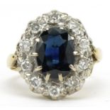 Large 18ct gold sapphire and diamond two tier cluster ring, the sapphire approximately 10.3mm x 7.