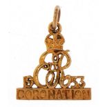 9ct gold Elizabeth 1953 Coronation charm, 1.7cm high, 1.5g : For further information on this lot