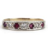 9ct gold ruby and diamond seven stone ring, the largest diamond approximately 2.5mm in diameter,
