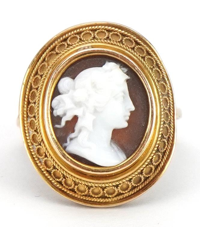 Continental unmarked gold cameo maiden head ring with filigree setting, tests as 9ct gold, size J,