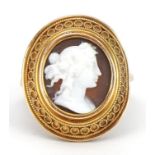 Continental unmarked gold cameo maiden head ring with filigree setting, tests as 9ct gold, size J,