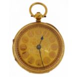 18ct gold ladies open face pocket watch with ornate gilt dial and engraved decoration, the