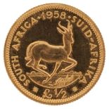 South Africa 1958 half pound gold coin - this lot is sold without buyer’s premium : For further