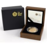Elizabeth II 2010 five pound brilliant uncirculated gold coin with fitted case, box and