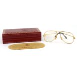 Pair of vintage Must de Cartier spectacles with fitted case numbered 5914, 14.5cm wide