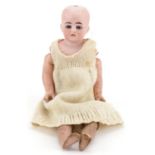 Heubach, antique German bisque headed doll, indistinct impressed marks to the neck, 36cm high