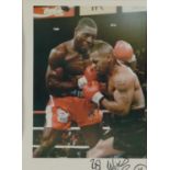 Frank Bruno signed display with print of him and Mike Tyson, mounted, framed and glazed, 40cm x 30cm