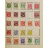 Collection of 19th century and later stamps arranged in an album.