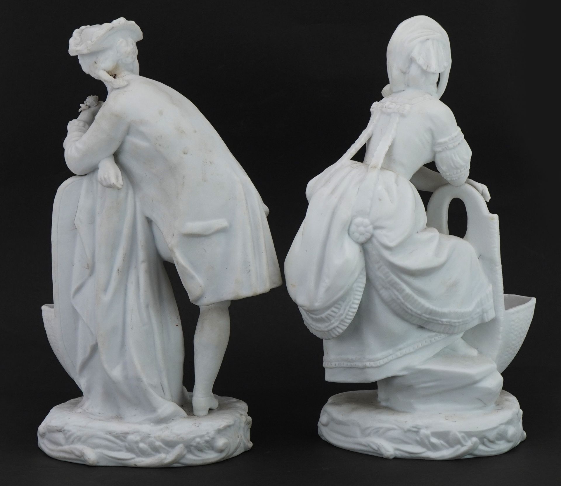 Pair of bisque porcelain figural salts in the style of Chelsea, the largest 26cm high - Image 2 of 4