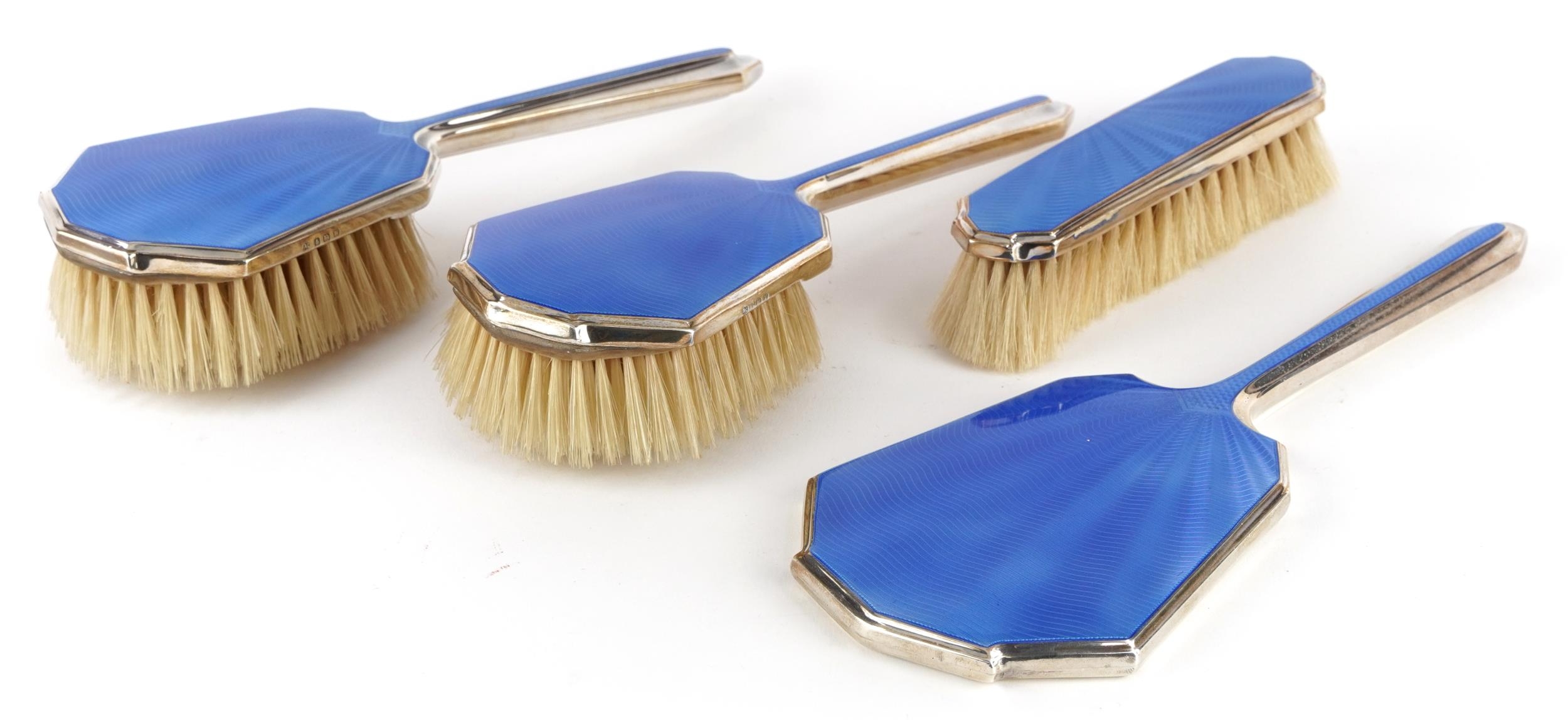 Albert Carter Art Deco style silver and blue guilloche enamel four piece dressing table set,