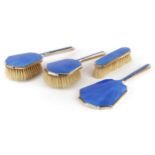 Albert Carter Art Deco style silver and blue guilloche enamel four piece dressing table set,