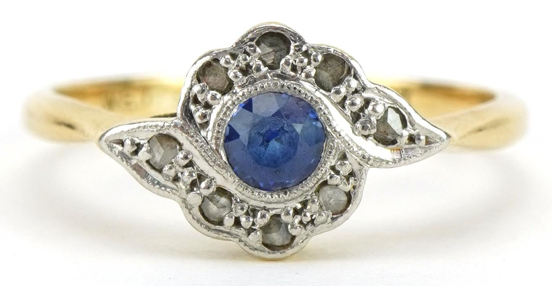 Art Deco 18ct gold and platinum sapphire and diamond crossover ring, the sapphire approximately 3.