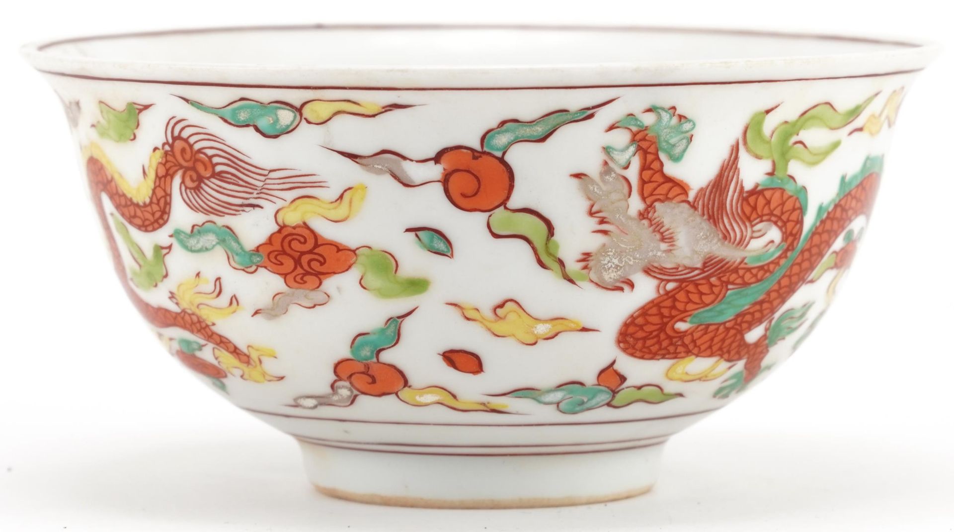 Chinese porcelain bowl hand painted with dragons amongst clouds, six figure character marks to the