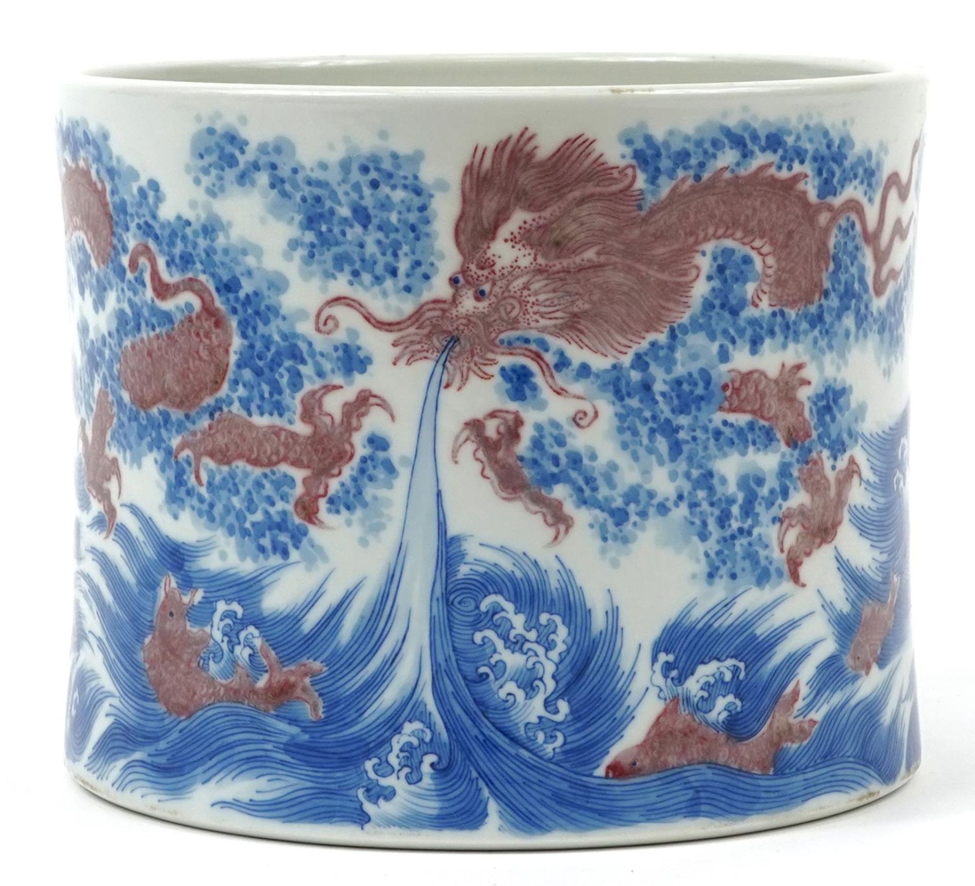 Chinese blue and white with iron red porcelain brush washer hand painted with a dragon chasing