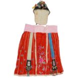 Chinese Canton silk skirt embroidered with flowers and a silk hat embroidered with a toad, the