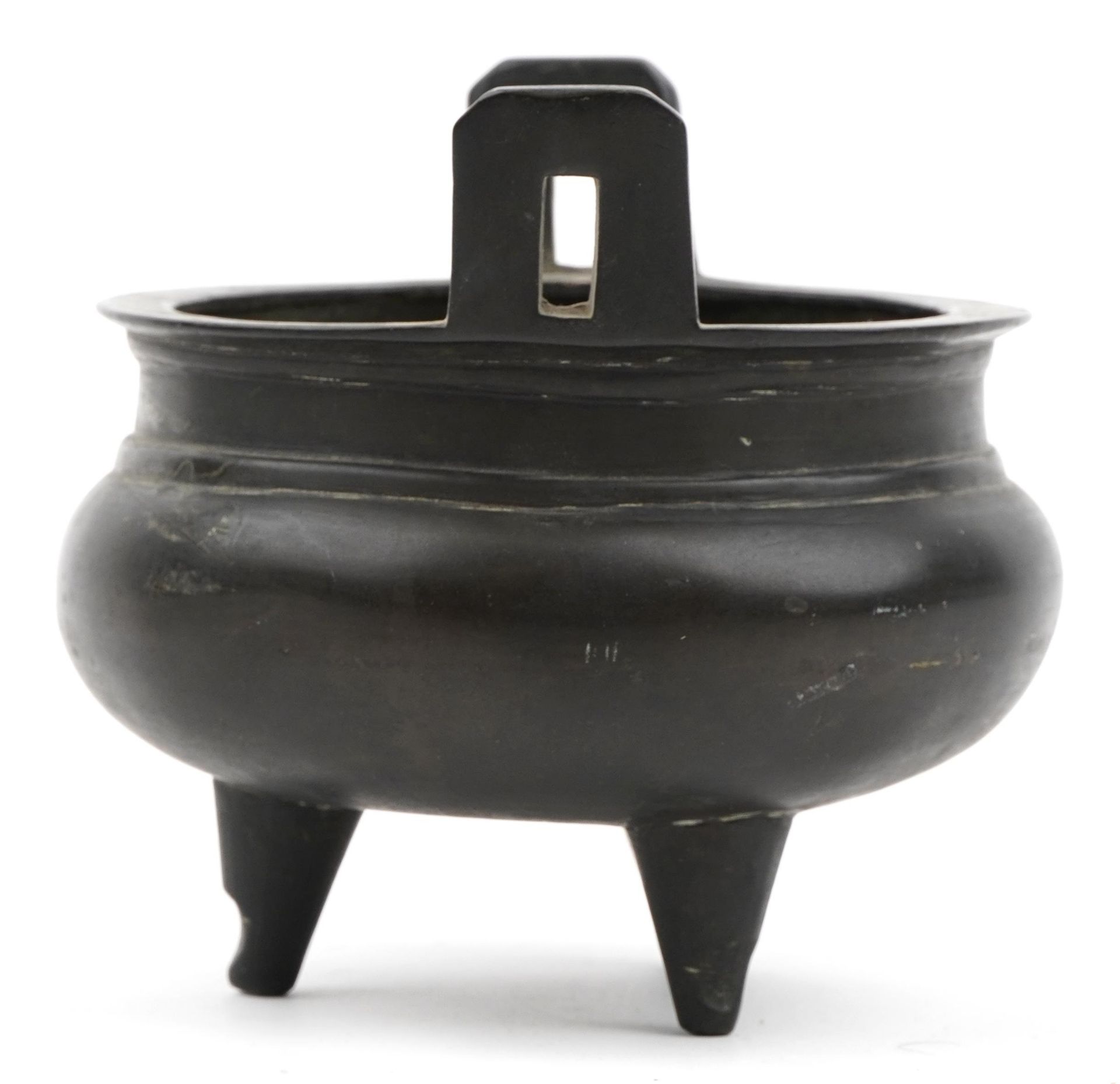 Chinese patinated bronze tripod censer with twin handles, six figure character marks to the base, - Image 4 of 14
