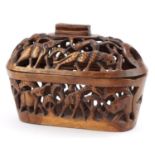 African pierced basket and cover carved with animals