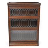 Oak Globe Wernicke style three section bookcase with leaded glass doors, 125cm H x 87cm W x 37cm D
