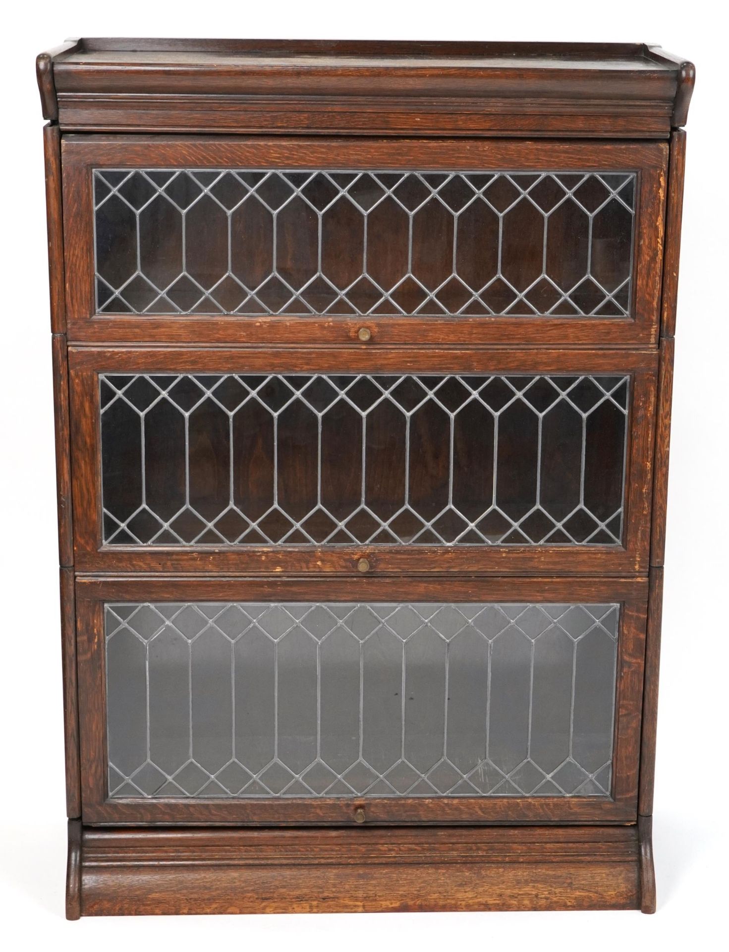 Oak Globe Wernicke style three section bookcase with leaded glass doors, 125cm H x 87cm W x 37cm D