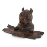 German Black Forest carved wood inkwell with glass liner and pen rest in the form of a dog's head,