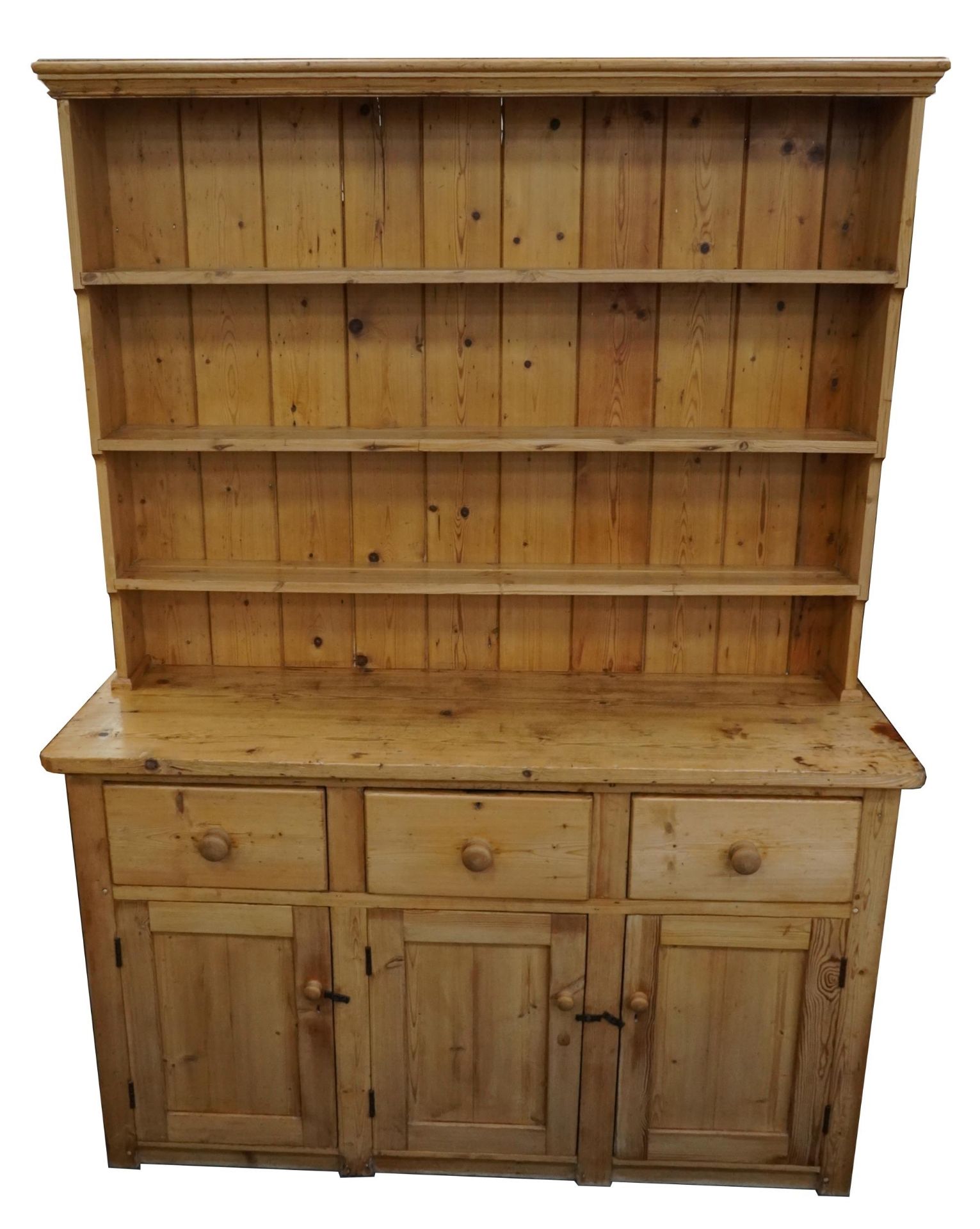 Large Victorian pine farmhouse dresser with open plate rack above three drawers and three cupboard