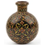 Turkish wrought iron flower vase enamelled with stylised flowers, 20cm high